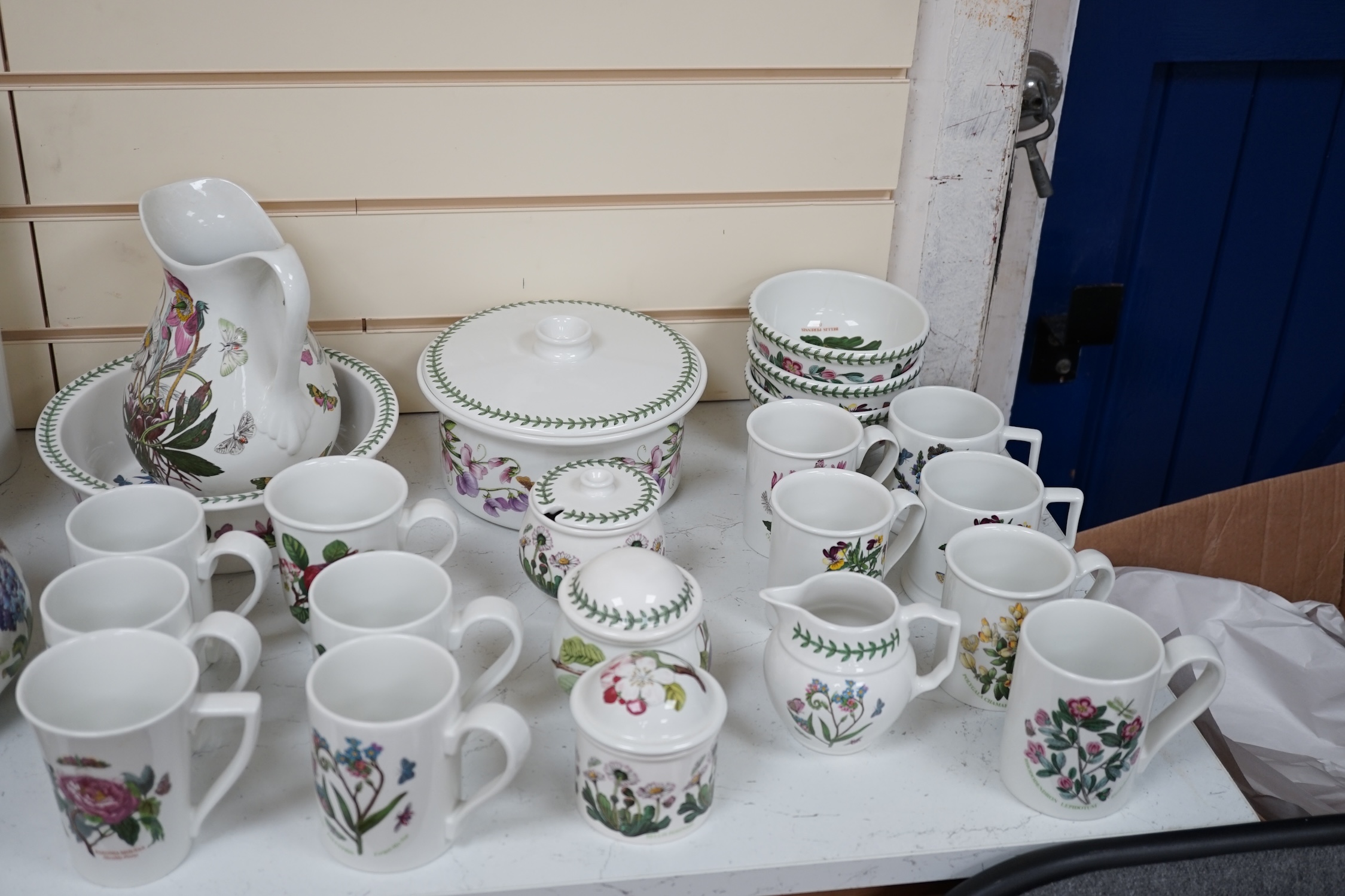 A large quantity of Portmeirion 'Botanic Gardens' tea, dinner and kitchen wares, together with cutlery and seven glass paperweights